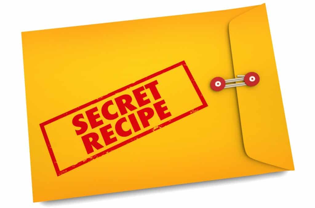 manilla envelope with "secret recipe" stamped on front in red