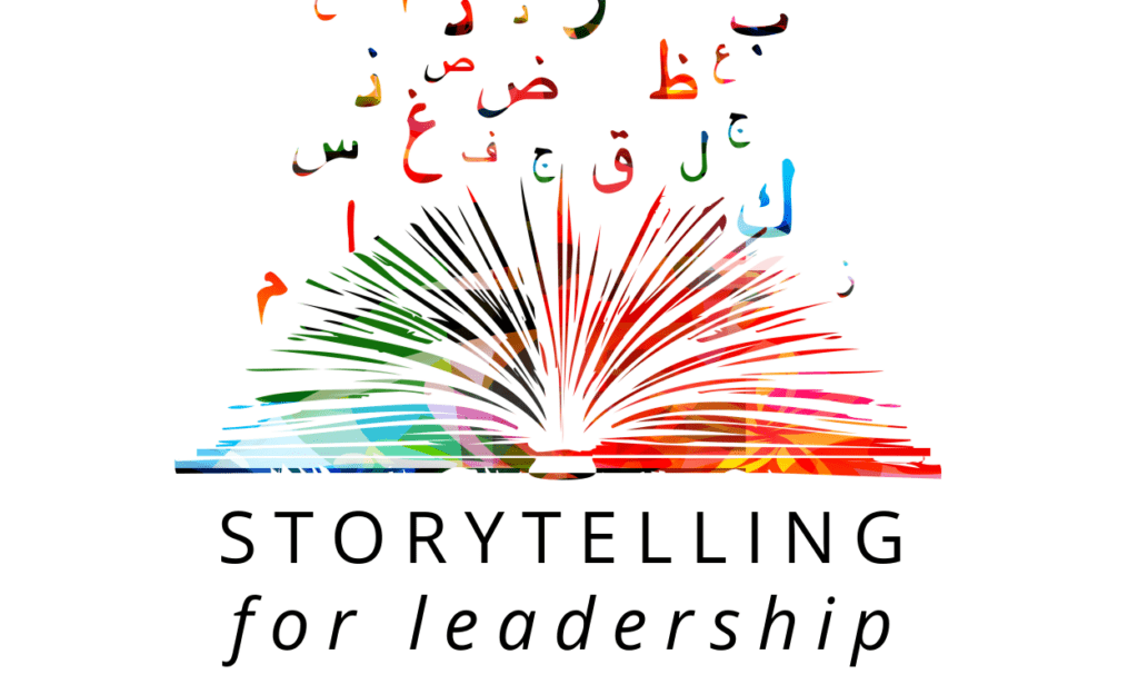 An illustration of an open book drawn with lots of colors and the words "storytelling for leadership" under the book