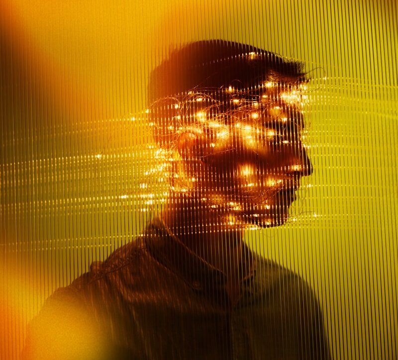a blurry image of a man in a black shirt
